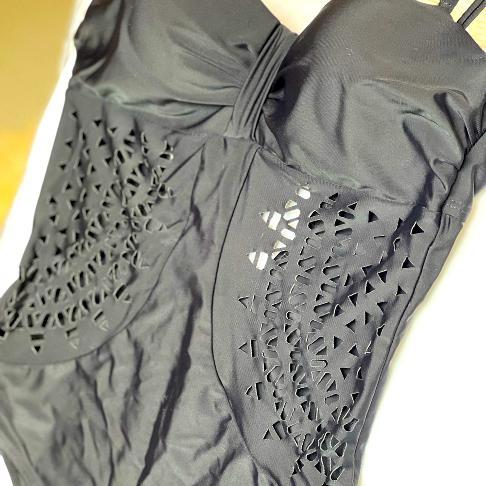 One piece bathing suit with cutouts